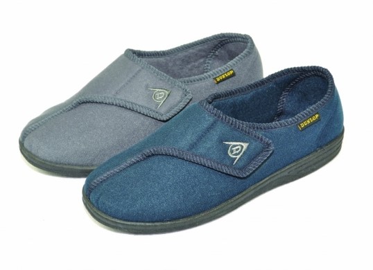 Two closed-toe slippers, one grey and one blue, with black rubber soles and Velcro straps, placed side by side on a white background.